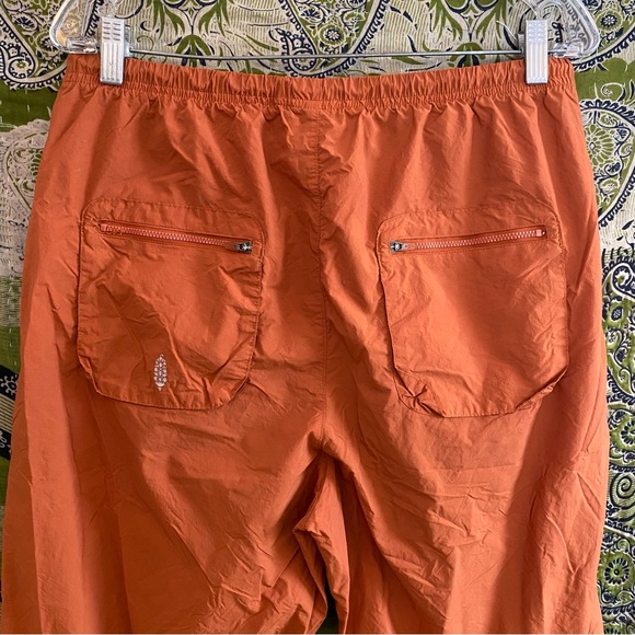 Free People Movement Red Earth Fly By Night Woven Pants Size Medium - Picture 10 of 16